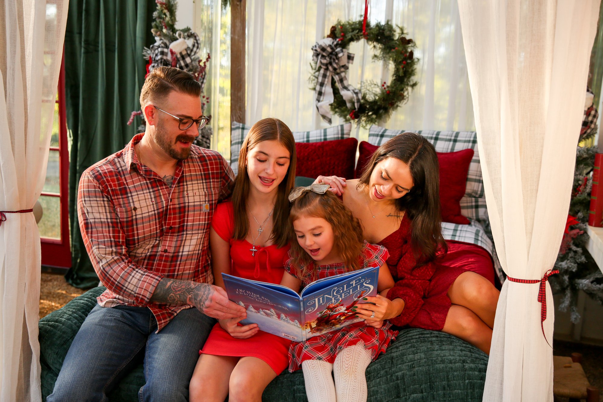A family reading a Christmas story together